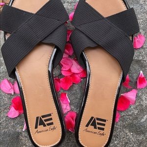 A black American Eagle (AE)slippers.